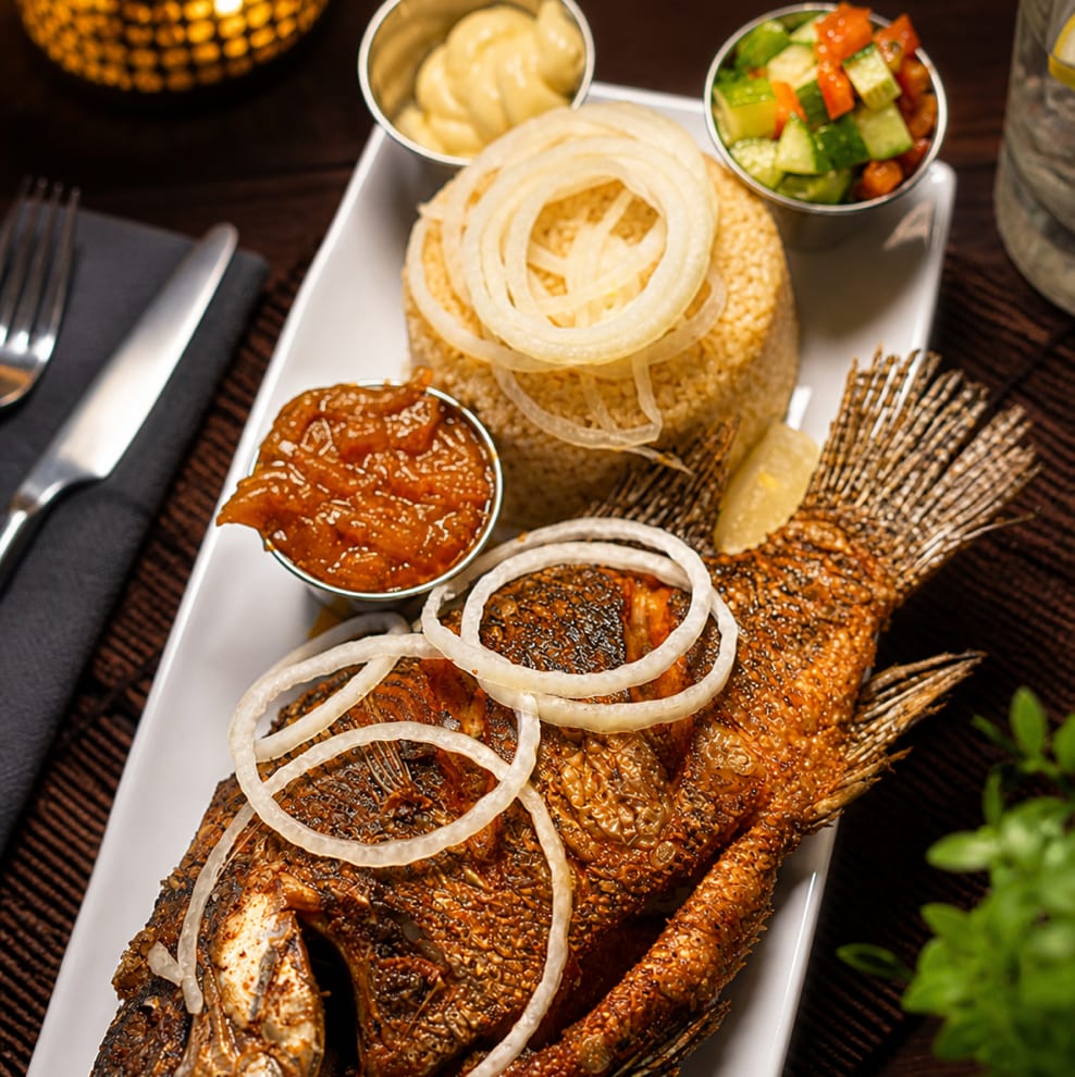 Garba (Attieke) & Fried Tilapia.